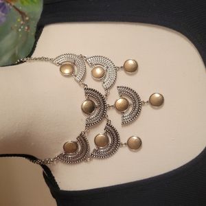 Chicos two-tone Cleopatra style necklace.